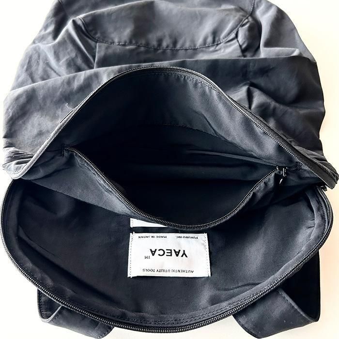 YAECA | UNISEX | SCARAB RUCKSACK | BLACK - Stripe-inc Online