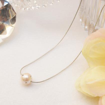 淡水真珠と埋め込みスワロフスキーのネックレス