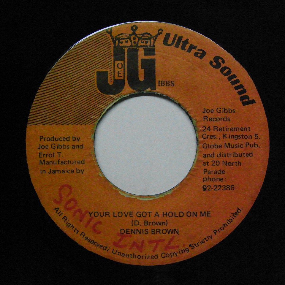 Dennis Brown / Your Love Got A Hold On Me - Tings & Time Records