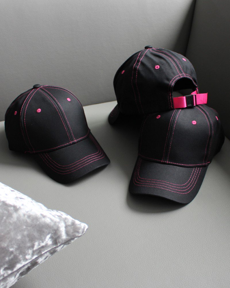 black and pink cap