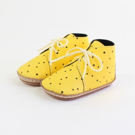 yellow infant shoes