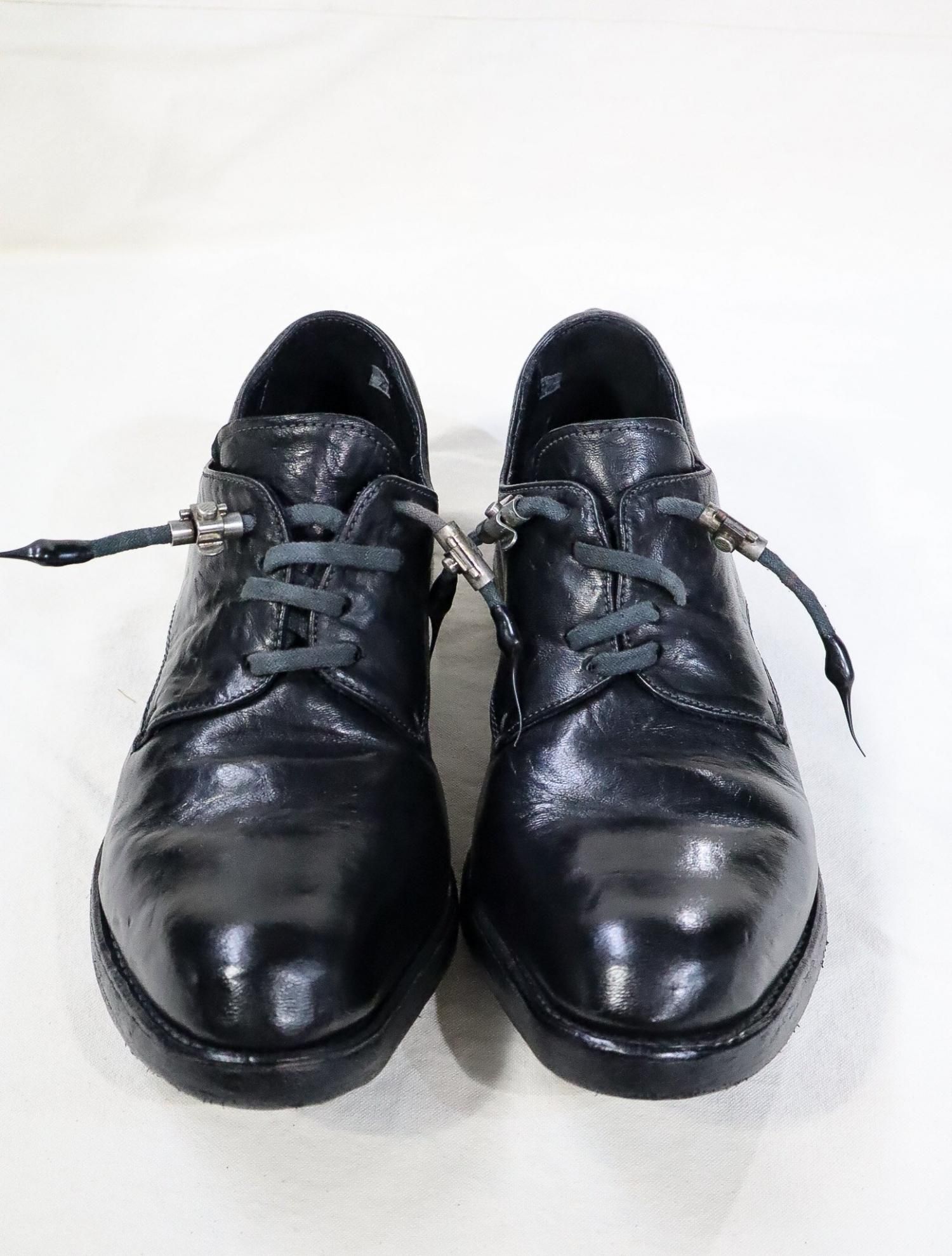 OBJECT DYED GOODYEAR PROSTHETIC SPUR-BITER OFFICER / CAROL