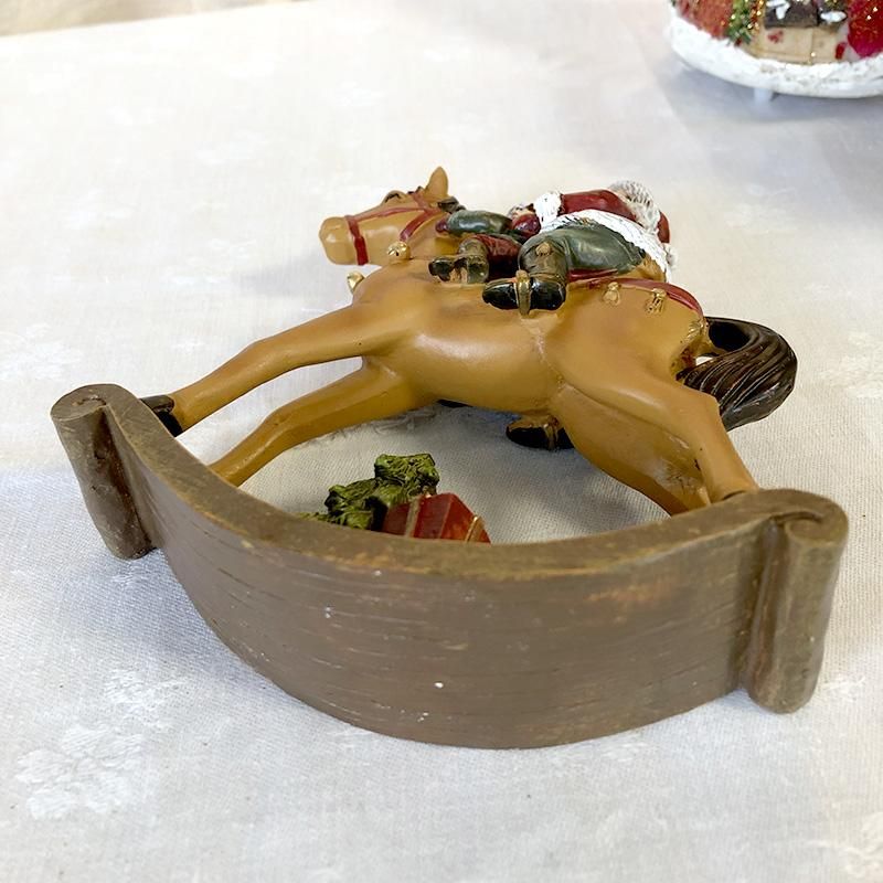 クリスマスの置物 揺れ木馬にまたがるサンタクロース- soracoya